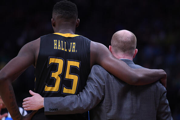 SACRAMENTO, CA - MARCH 17:  Jimmy Hall #35 is consoled by his Head coach Rob Senderoff of the Kent State Golden Flashes as his team loses to the UCLA Bruins during the first round of the 2017 NCAA Men's Basketball Tournament at Golden 1 Center on March 17, 2017 in Sacramento, California.  (Photo by Thearon W. Henderson/Getty Images)