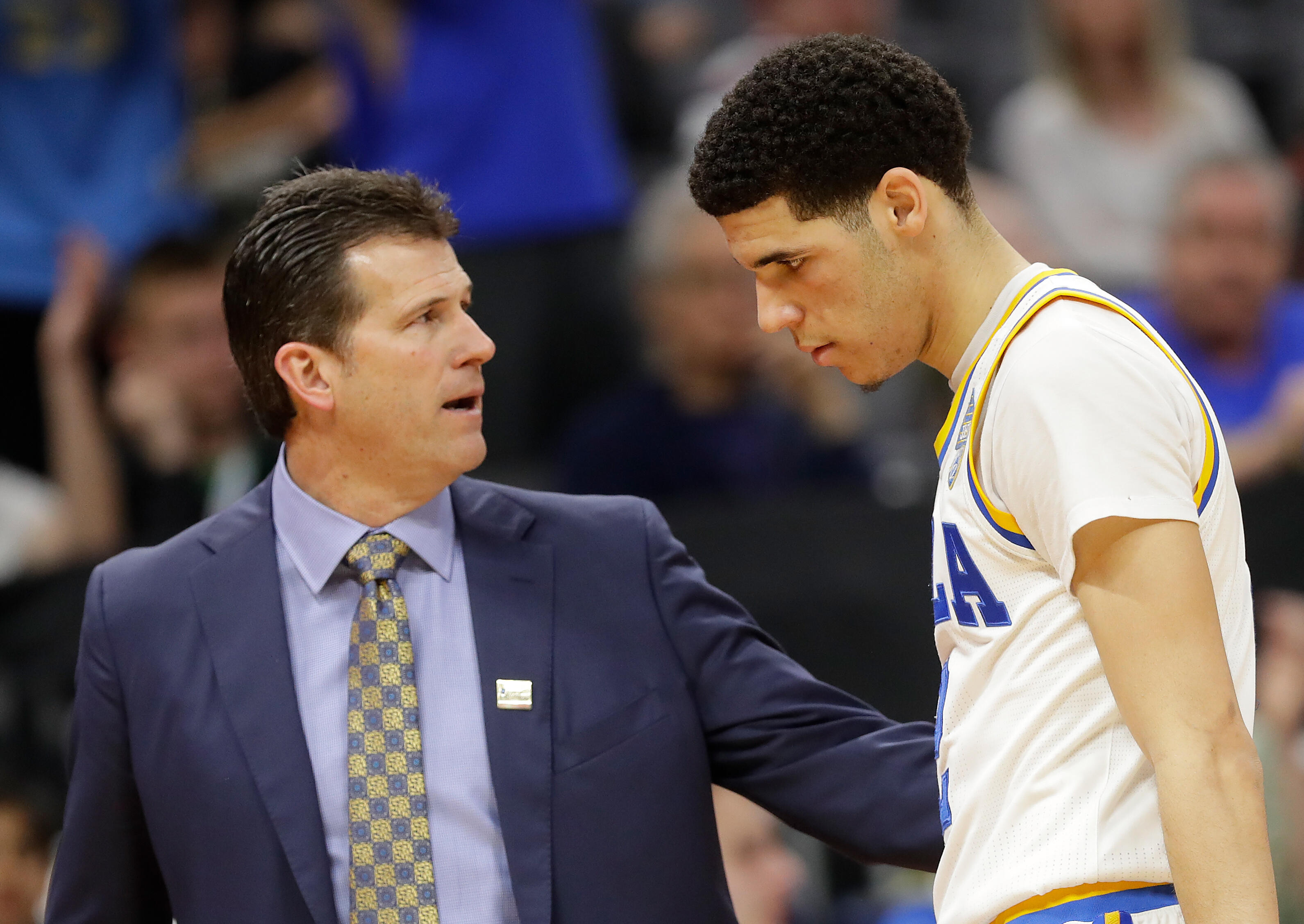 SACRAMENTO, CA - MARCH 17:  Lonzo Ball #2 is congratulated by his Head coach Steve Alford of the UCLA Bruins as his team defeats the Kent State Golden Flashes during the first round of the 2017 NCAA Men's Basketball Tournament at Golden 1 Center on March 
