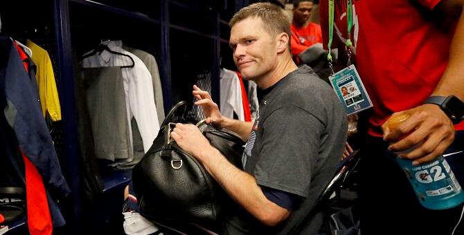 HOUSTON, TX - FEBRUARY 05:  Tom Brady #12 of the New England Patriots looks for his missing jersey in the locker room after defeating the Atlanta Falcons during Super Bowl 51 at NRG Stadium on February 5, 2017 in Houston, Texas. The Patriots defeated the 