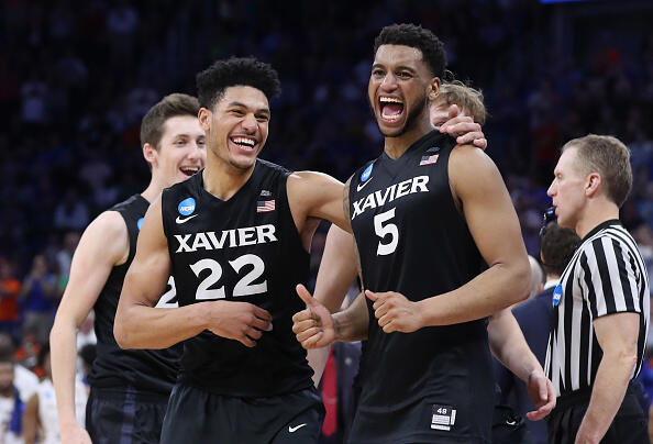 ORLANDO, FL - MARCH 18:  Kaiser Gates #22 and Trevon Bluiett #5 of the Xavier Musketeers celebrate their 91-66 over the Florida State Seminoles to advance during the second round of the 2017 NCAA Men's Basketball Tournament at the Amway Center on March 18, 2017 in Orlando, Florida.  (Photo by Rob Carr/Getty Images)