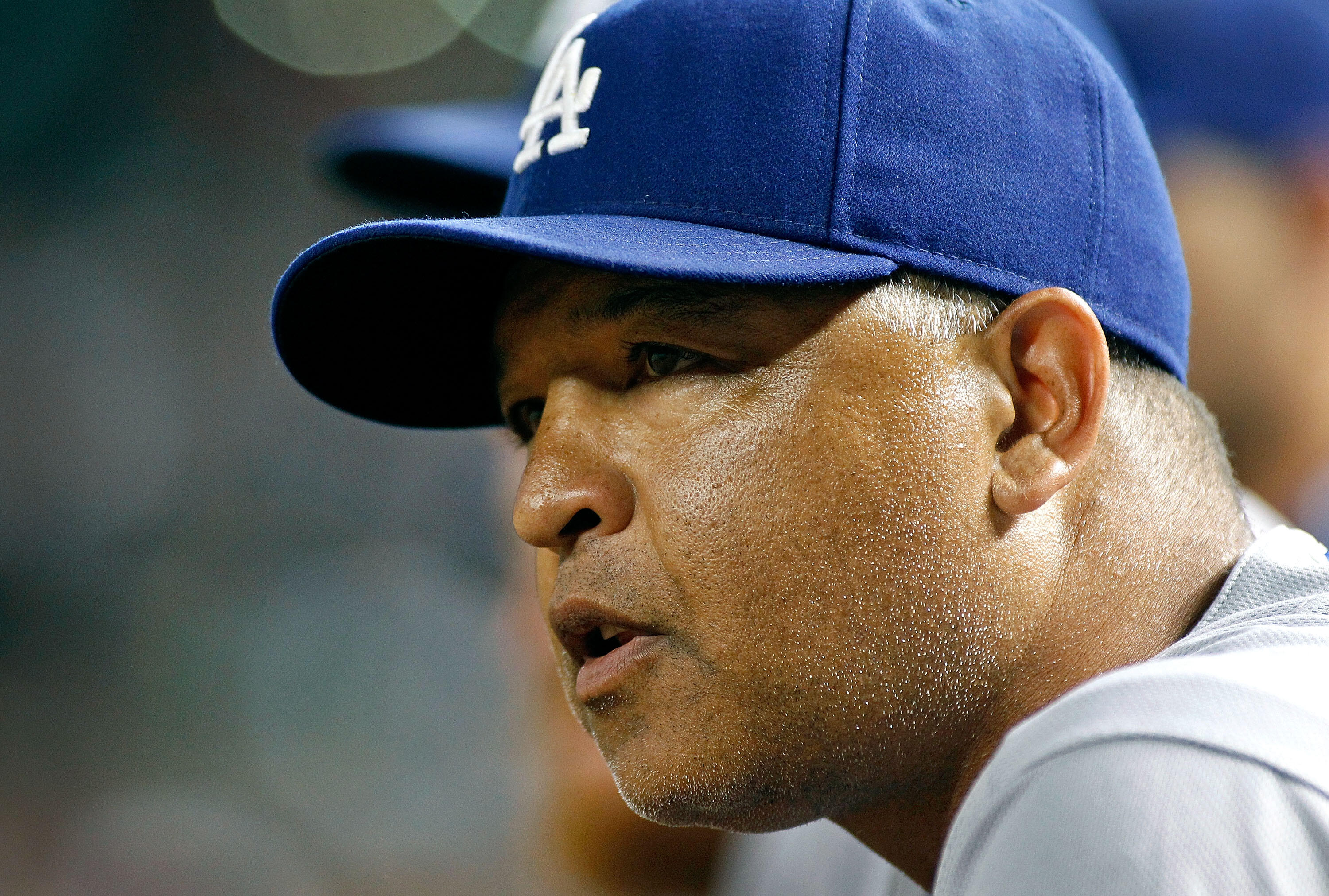 Los Angeles Dodgers manager Dave Roberts (30) looks on before the first  inning of a baseball