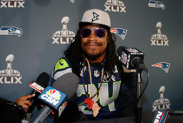 CHANDLER, AZ - JANUARY 28:  Running back Marshawn Lynch #24 of the Seattle Seahawks speaks during a Super Bowl XLIX media availability at the Arizona Grand Hotel on January 28, 2015 in Chandler, Arizona.  (Photo by Christian Petersen/Getty Images)