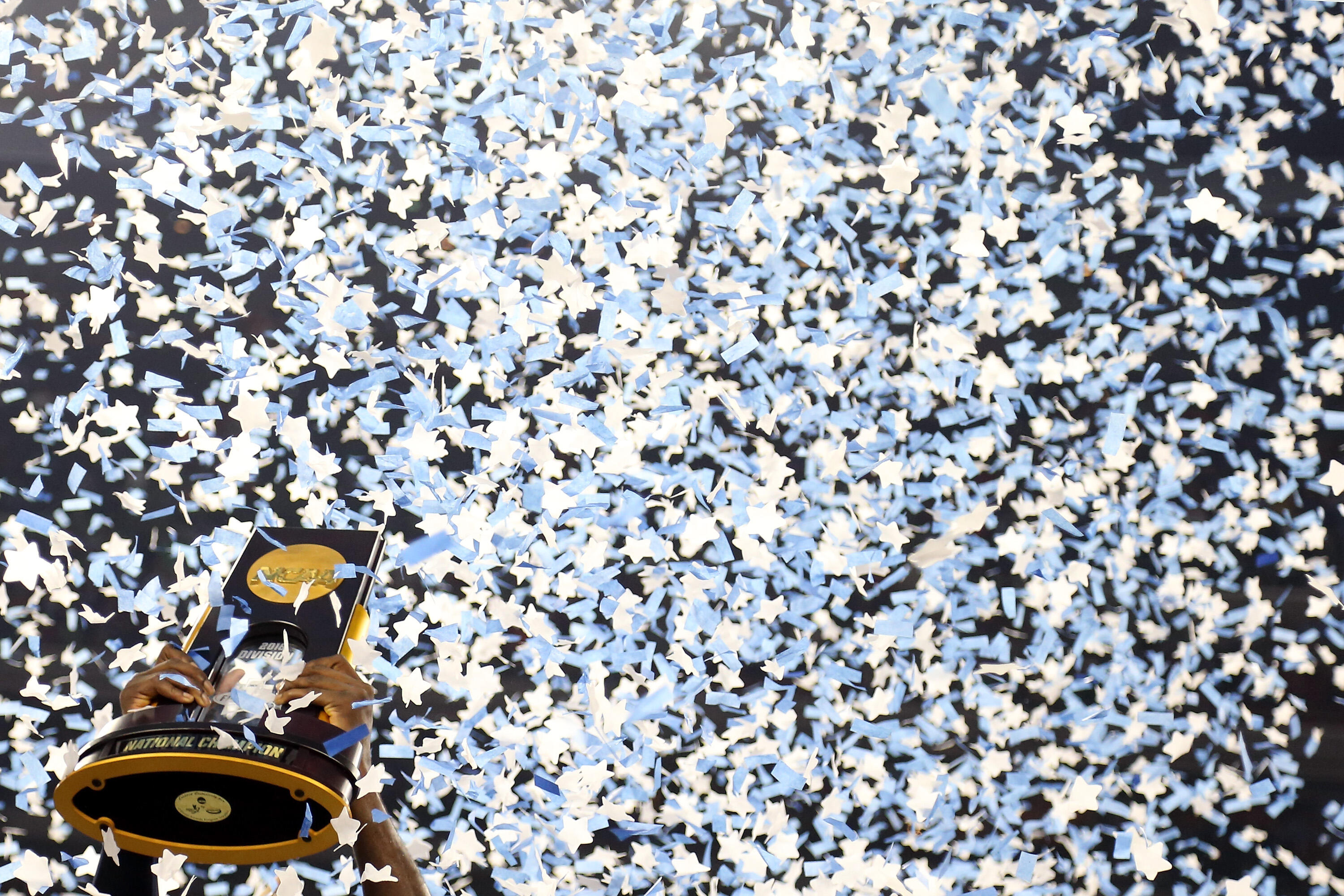 HOUSTON, TEXAS - APRIL 04:  The Villanova Wildcats hoist the trophy after defeating the North Carolina Tar Heels 77-74 to win the 2016 NCAA Men's Final Four National Championship game at NRG Stadium on April 4, 2016 in Houston, Texas.  (Photo by Streeter 