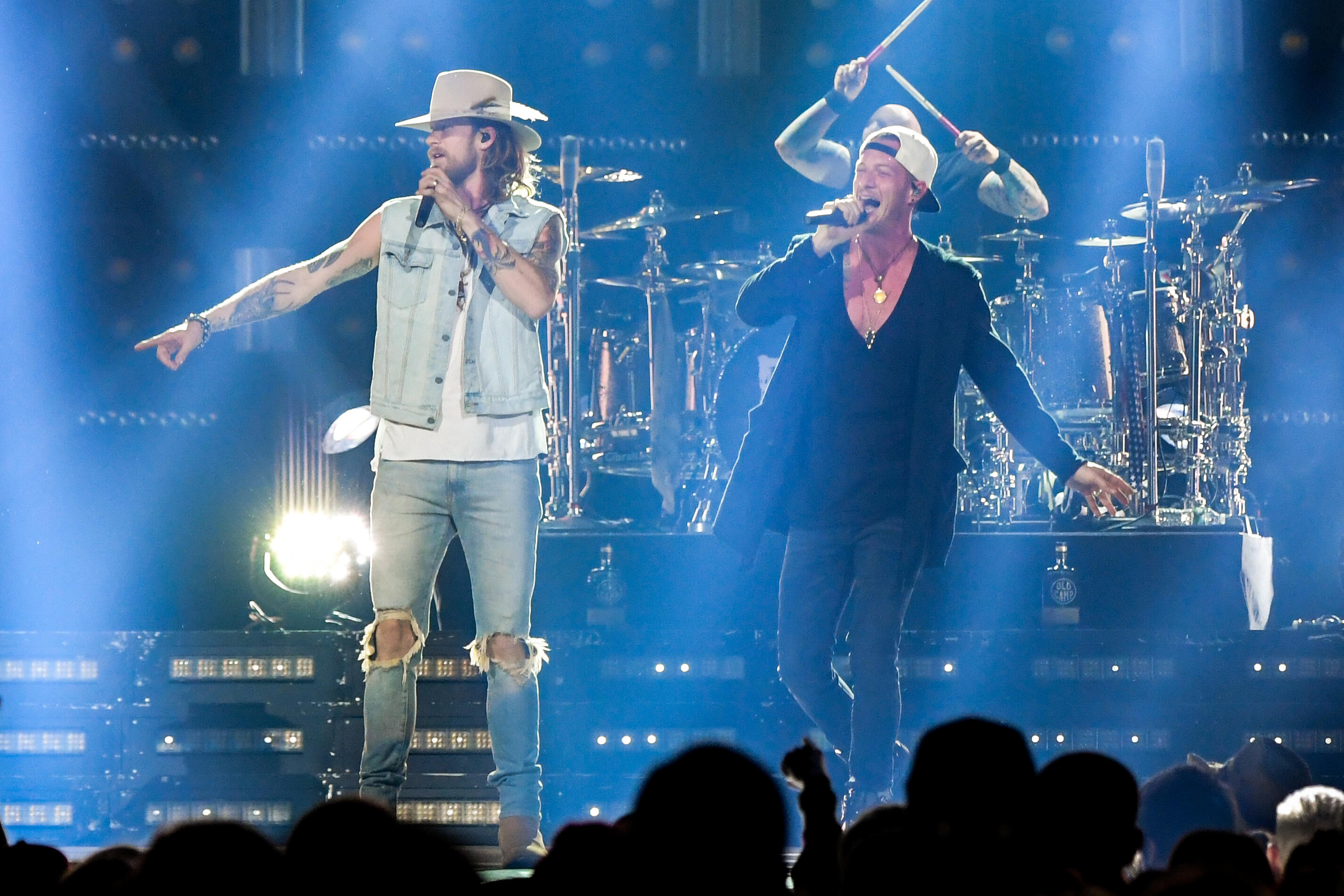 NEWARK, NJ - MARCH 18:  Brian Kelley (L) and Tyler Hubbard of Florida Georgia Line perform during their Dig Your Roots Tour at Newark, New Jersey at Prudential Center on March 18, 2017 in Newark, New Jersey.  (Photo by Mike Coppola/Getty Images)