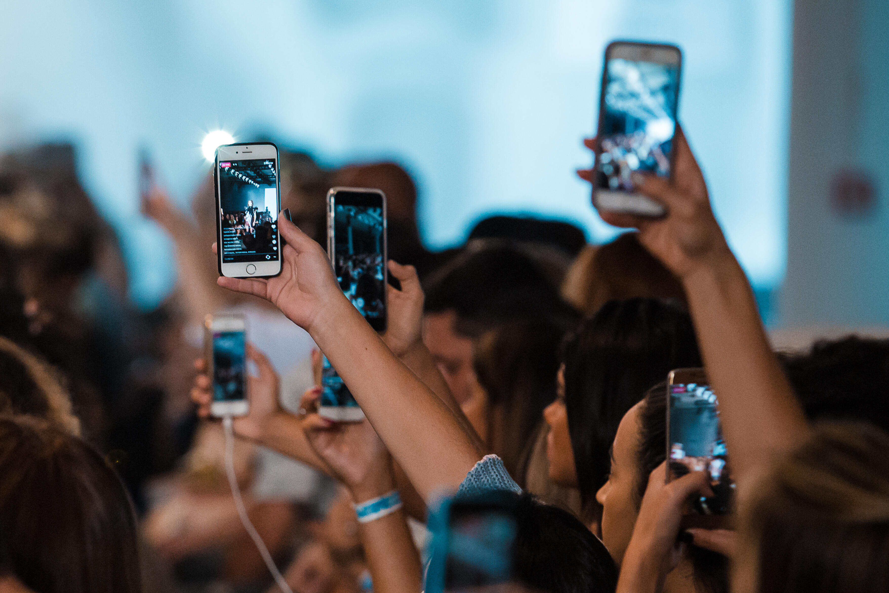 SAO PAULO, BRAZIL - MARCH 16: An alternative view of the audience with cell phones in live facebook and snapchat in Tig fashion show at Sao Paulo Fashion Week N 43 SPFW Fall/Winter 2017 on March 16, 2017 in Sao Paulo, Sao Paulo. (Photo by Mauricio Santana