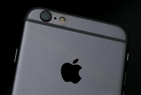 SAN FRANCISCO, CA - JULY 21:  The Apple logo is displayed on an iPhone 6 on July 21, 2015 in San Francisco, California. Apple reported a 38 percent surge in third quarter earnings with a profit of $10.7 billion compared to $7.74 billion one year ago. The quarterly earnings were boosted by strong demand for the latest iPhones.  (Photo by Justin Sullivan/Getty Images)