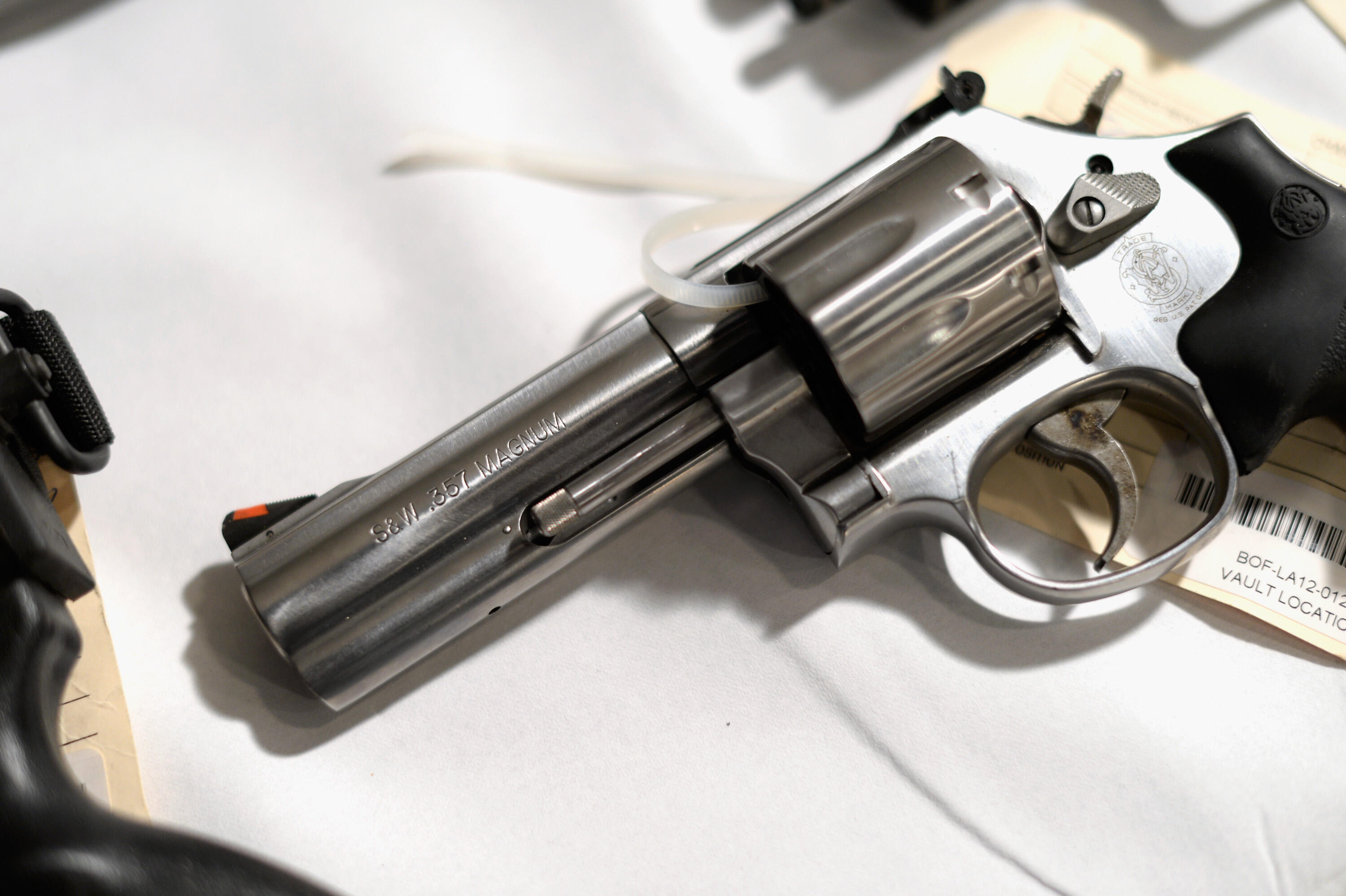 LOS ANGELES, CA - MAY 17:  A handgun seized during recent sweeps is shown on display at a news conference on May 17, 2013 at the Los Angeles Civic Center in Los Angeles, California. California Attorney General Kamala Harris hosted a meeting of the state's