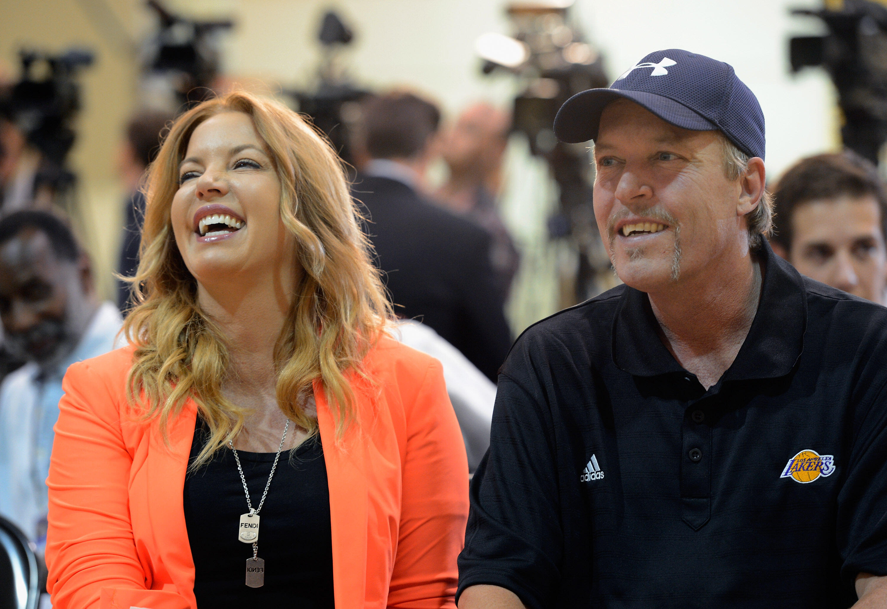 EL SEGUNDO, CA - AUGUST 10:  Jim Buss and his sister Jeanie Buss of the Los Angeles lakers attend a news conference where Dwight Howard was introduced as the newest member of the team at the Toyota Sports Center on August 10, 2012 in El Segundo, Californi