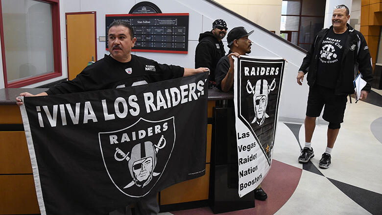LAS VEGAS, NV - APRIL 28:  (L-R) Oakland Raiders fans Tony Curiel, Eric Carrillo, Richard Cervera, and John Baietti, all of Nevada, wait for Raiders owner Mark Davis to arrive at a Southern Nevada Tourism Infrastructure Committee meeting at UNLV with Raid