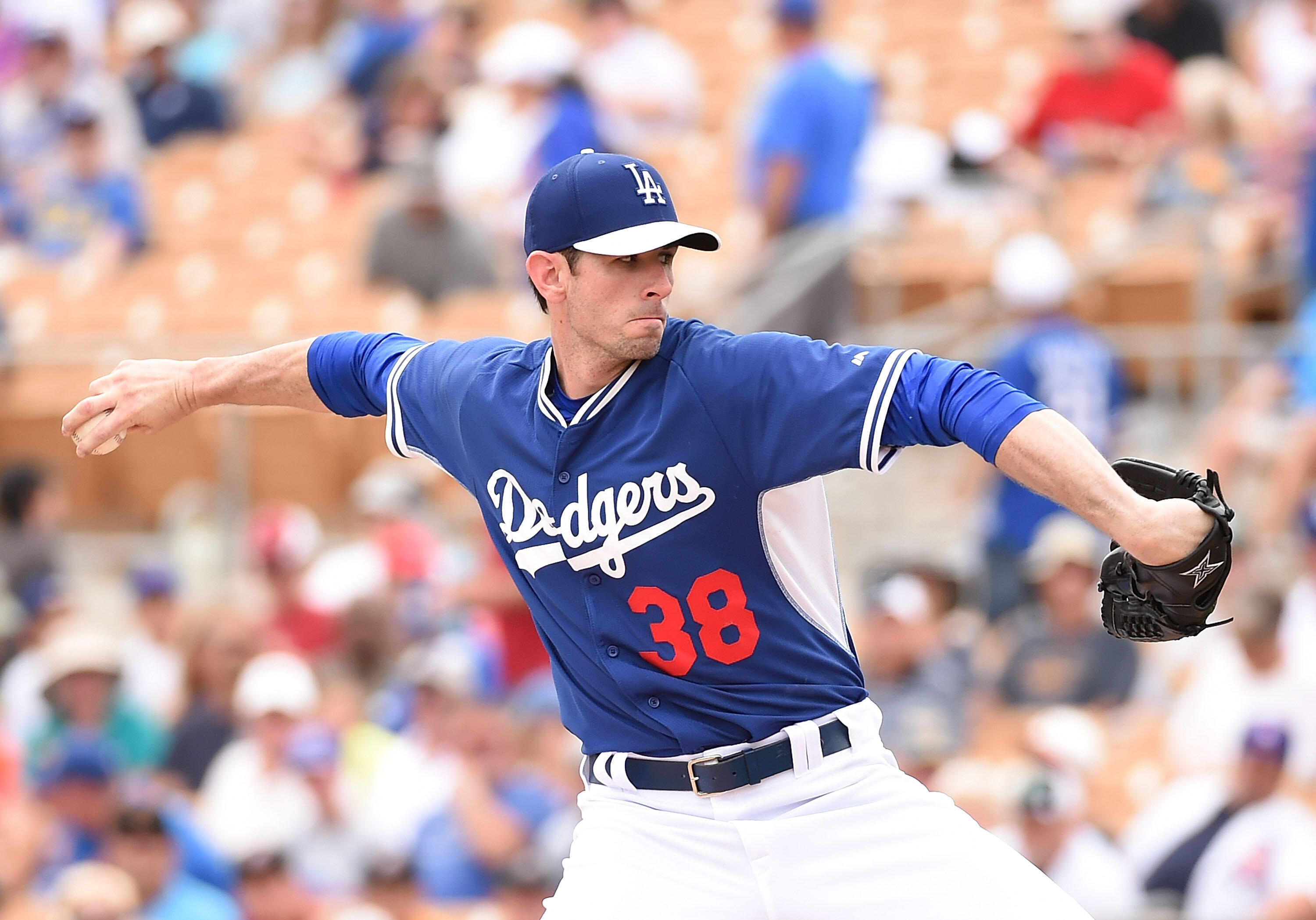 GLENDALE, AZ - MARCH 18:  Brandon McCarthy #38 of the Los Angeles Dodgers delivers a first inning pitch against the Chicago Cubs at Camelback Ranch on March 18, 2015 in Glendale, Arizona.  (Photo by Norm Hall/Getty Images)