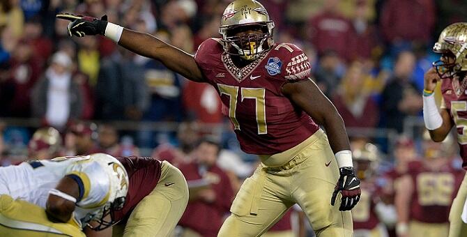 CHARLOTTE, NC - DECEMBER 06:  Roderick Johnson #77 of the Florida State Seminoles calls out his blocking assignment against the Georgia Tech Yellow Jackets in the 2nd half during the Atlantic Coast Conference championship game on December 6, 2014 in Green