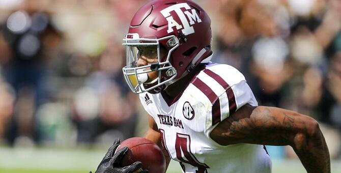 STARKVILLE, MS - NOVEMBER 5:  Defensive back Justin Evans #14 of the Texas A&M Aggies carries the ball on a punt return during the first half of an NCAA college football game against the Mississippi State Bulldogs at Davis Wade Stadium on November 5, 2016