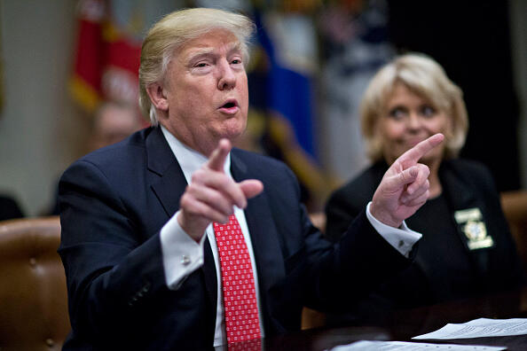 WASHINGTON, DC - FEBRUARY 7:  (AFP OUT) U.S. President Donald Trump speaks as he meets with county sheriffs during a listening session in the Roosevelt Room of the White House on February 7, 2017 in Washington, DC.  The Trump administration will return to court Tuesday to argue it has broad authority over national security and to demand reinstatement of a travel ban on seven Muslim-majority countries that stranded refugees and triggered protests. (Photo by Andrew Harrer - Pool/Getty Images)