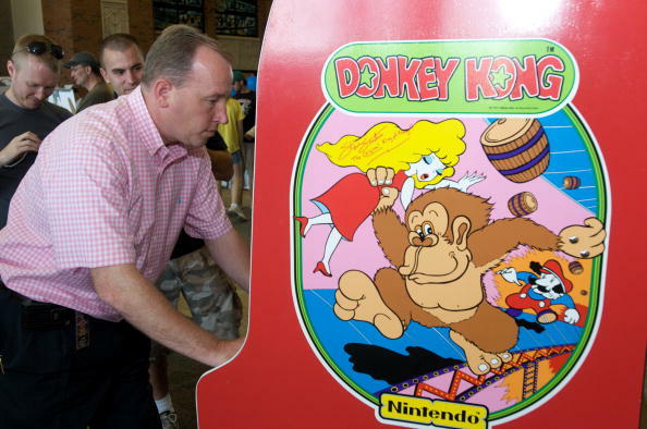 OTTUMWA, IA - AUGUST 13: Steve Sanders, 'The Orignal King of Kong,' plays Donkey Kong at the launch party for the International Video Game Hall of Fame and Museum on August 13, 2009 in Ottumwa, Iowa. Ottumwa was officially proclaimed the Video Game Capita