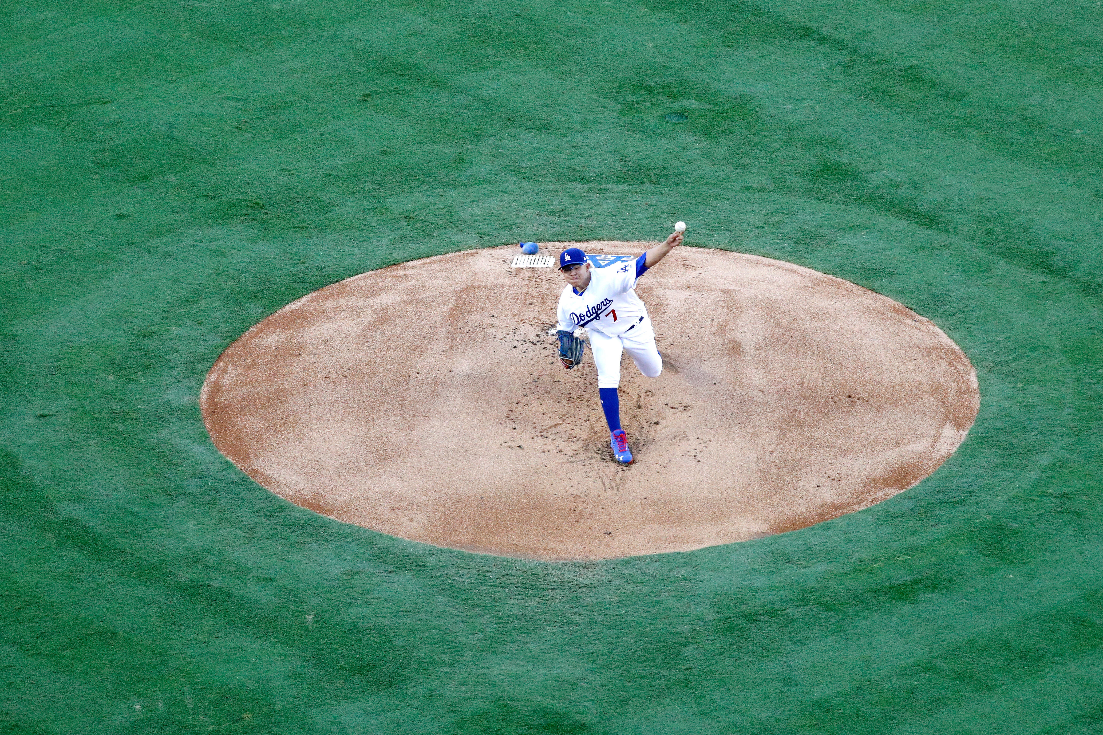 LOS ANGELES, CA - OCTOBER 19:  Julio Urias #7 of the Los Angeles Dodgers pitches in the first inning against the Chicago Cubs in game four of the National League Championship Series at Dodger Stadium on October 19, 2016 in Los Angeles, California.  (Photo