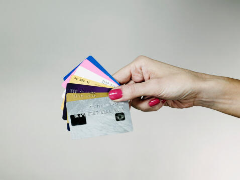 Hand with credit cards