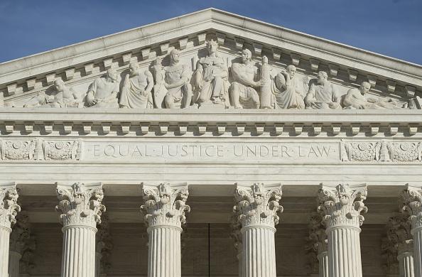 The US Supreme Court is seen in Washington, DC, on January 31, 2017. President Donald Trump was poised Tuesday to unveil his pick for the US Supreme Court, a crucial appointment that could tilt the bench to conservatives on deeply divisive issues such as abortion and gun control. Trump's choice aims to fill a vacancy left by the sudden death of conservative justice Antonin Scalia in February 2016, which left the highest US court with four conservative and four liberal justices.  / AFP / SAUL LOEB        (Photo credit should read SAUL LOEB/AFP/Getty Images)