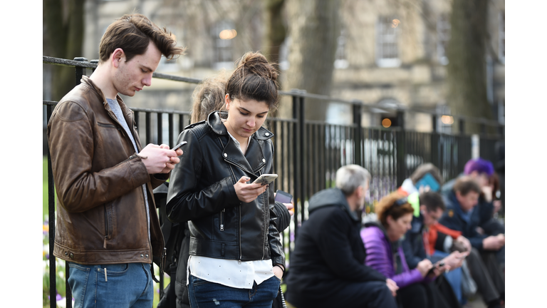 People on phones