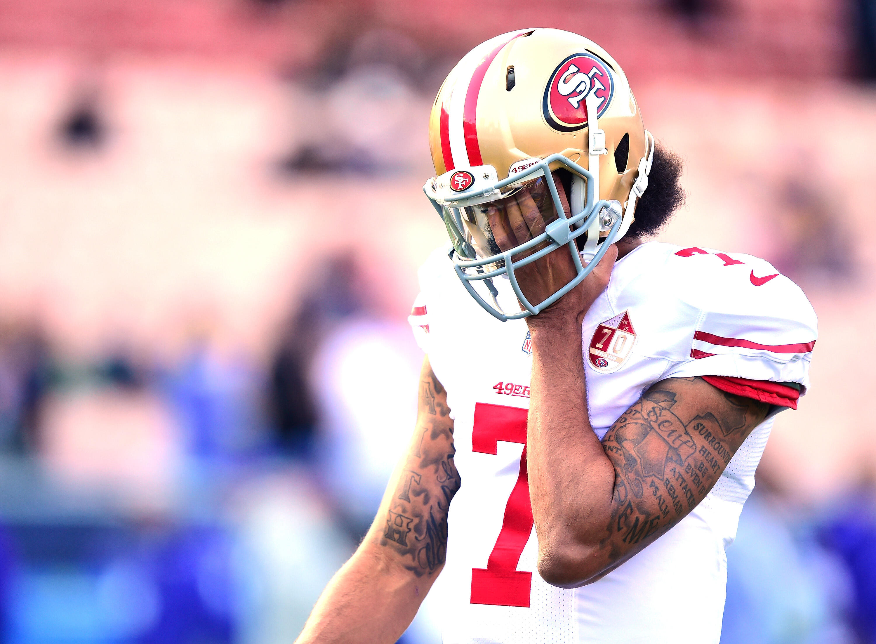 LOS ANGELES, CA - DECEMBER 24:  Colin Kaepernick #7 of the San Francisco 49ers warms up before the game against the Los Angeles Rams at Los Angeles Memorial Coliseum on December 24, 2016 in Los Angeles, California.  (Photo by Harry How/Getty Images)