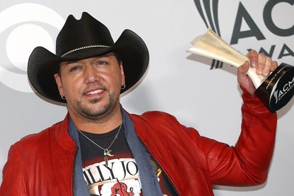 Jason Aldean poses with the Entertainer of the Year award in the press room of the 52nd Academy of Country Music Awards on April 2, 2017, at the T-Mobile Arena in Las Vegas, Nevada. / AFP PHOTO / Tommaso Boddi        (Photo credit should read TOMMASO BODDI/AFP/Getty Images)