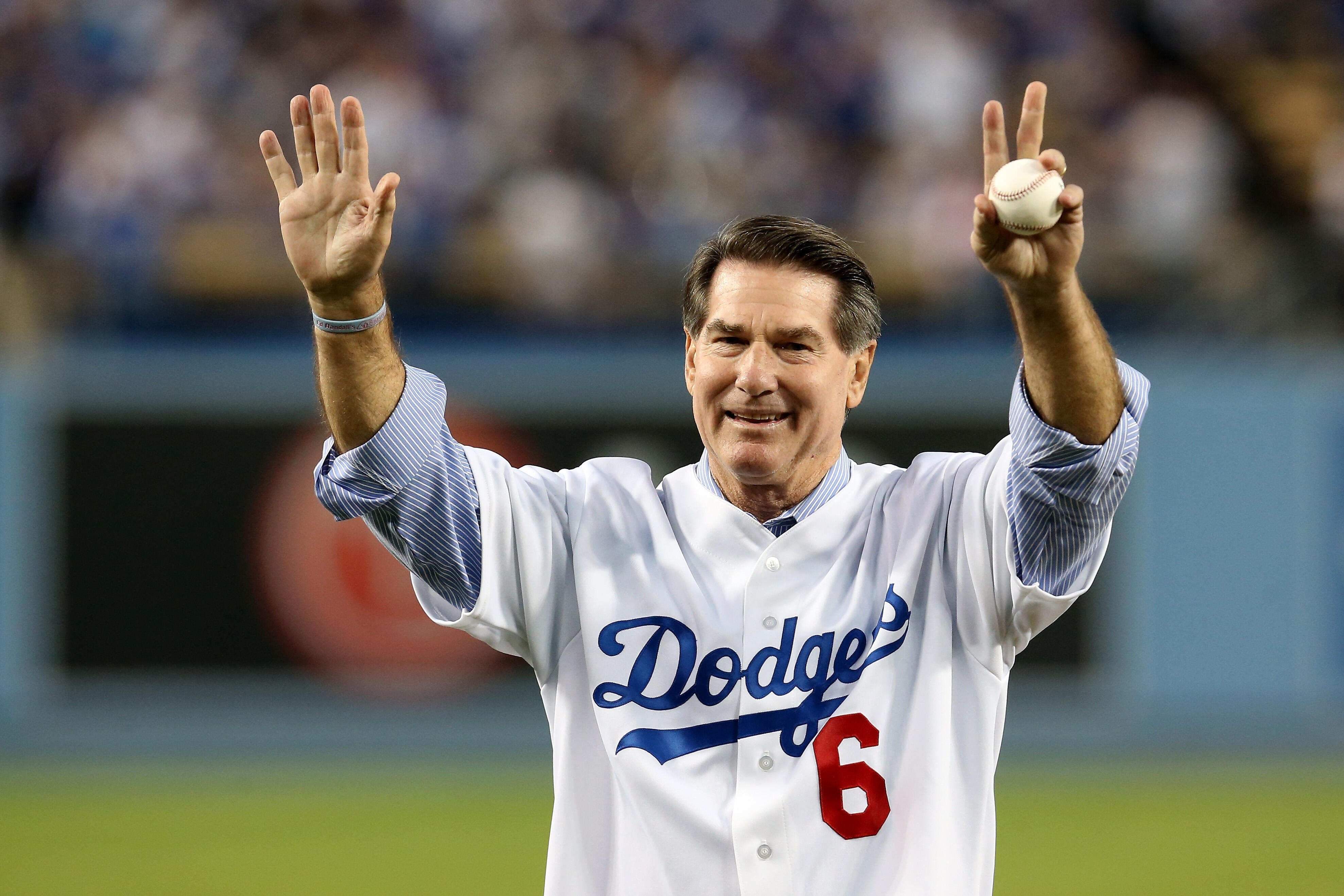 LOS ANGELES, CA - OCTOBER 07:  Los Angeles Dodgers legend Steve Garvey throws out a ceremonial first pitch before the Dodgers take on the Atlanta Braves in Game Four of the National League Division Series at Dodger Stadium on October 7, 2013 in Los Angele