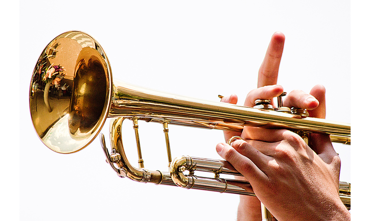Playing trumpet