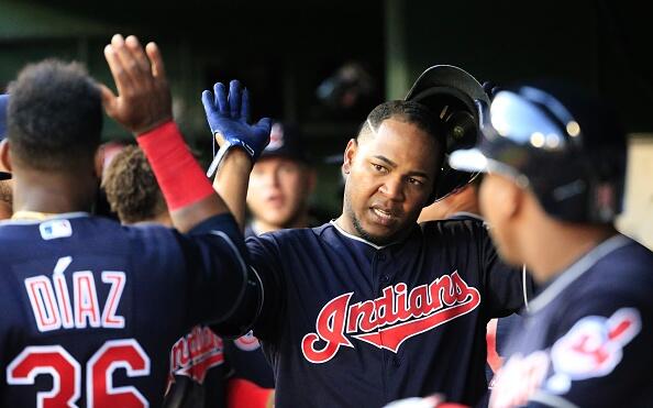 ARLINGTON, TX - APRIL 3: Edwin Encarnacion #10 of the Cleveland Indians celebrates with teammates after scoring against the Texas Rangers in the fourth inning on Opening Day at Globe Life Park in Arlington on April 3, 2017 in Arlington, Texas. (Photo by Ron Jenkins/Getty Images)