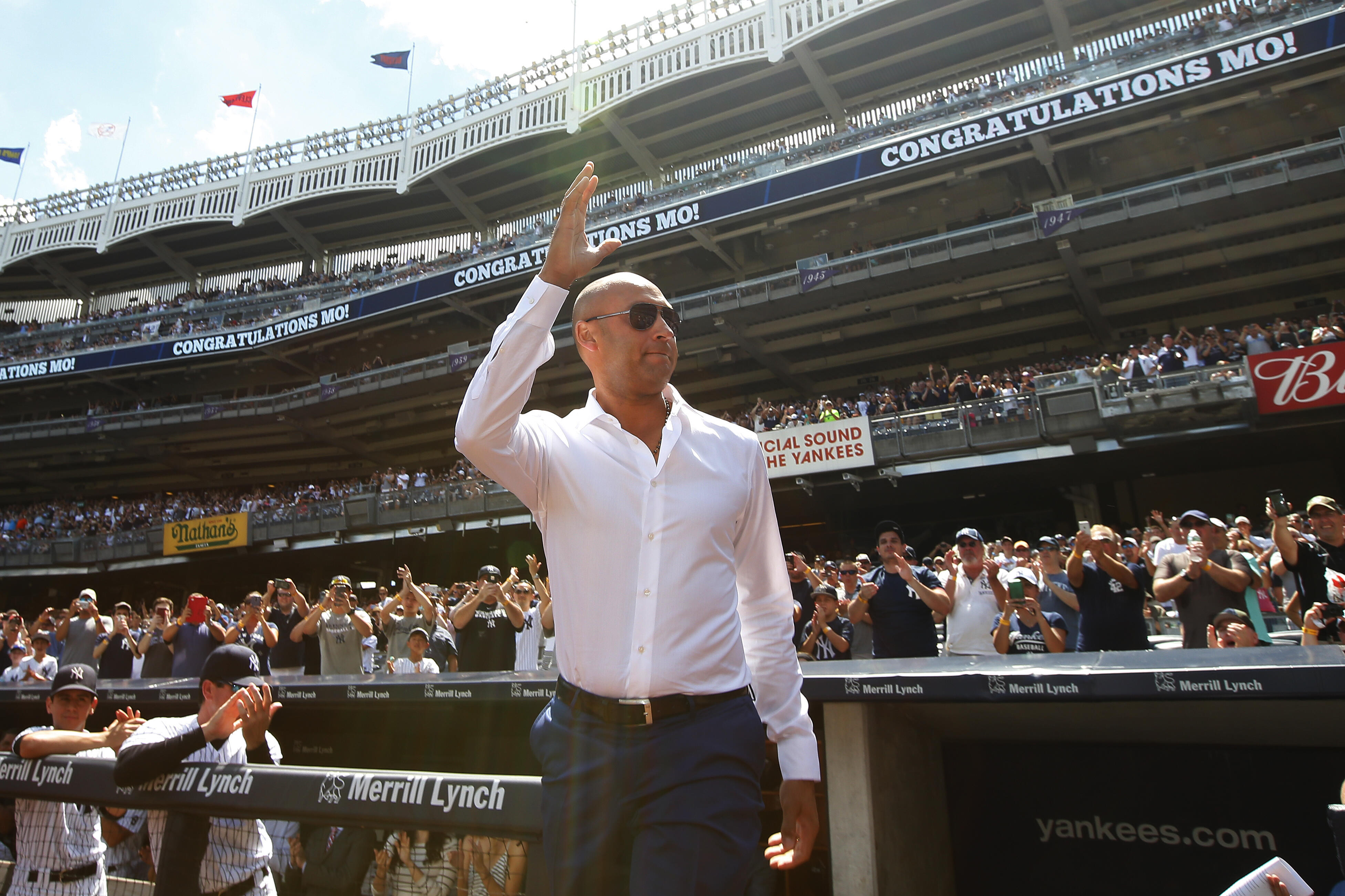 NEW YORK, NY - AUGUST 14: Former New York Yankee Derek Jeter acknowledges the crowd as he is introduced during a ceremony honoring Mariano Rivera before a game between the Tampa Bay Rays and the New York Yankees at Yankee Stadium on August 14,  in the Bro
