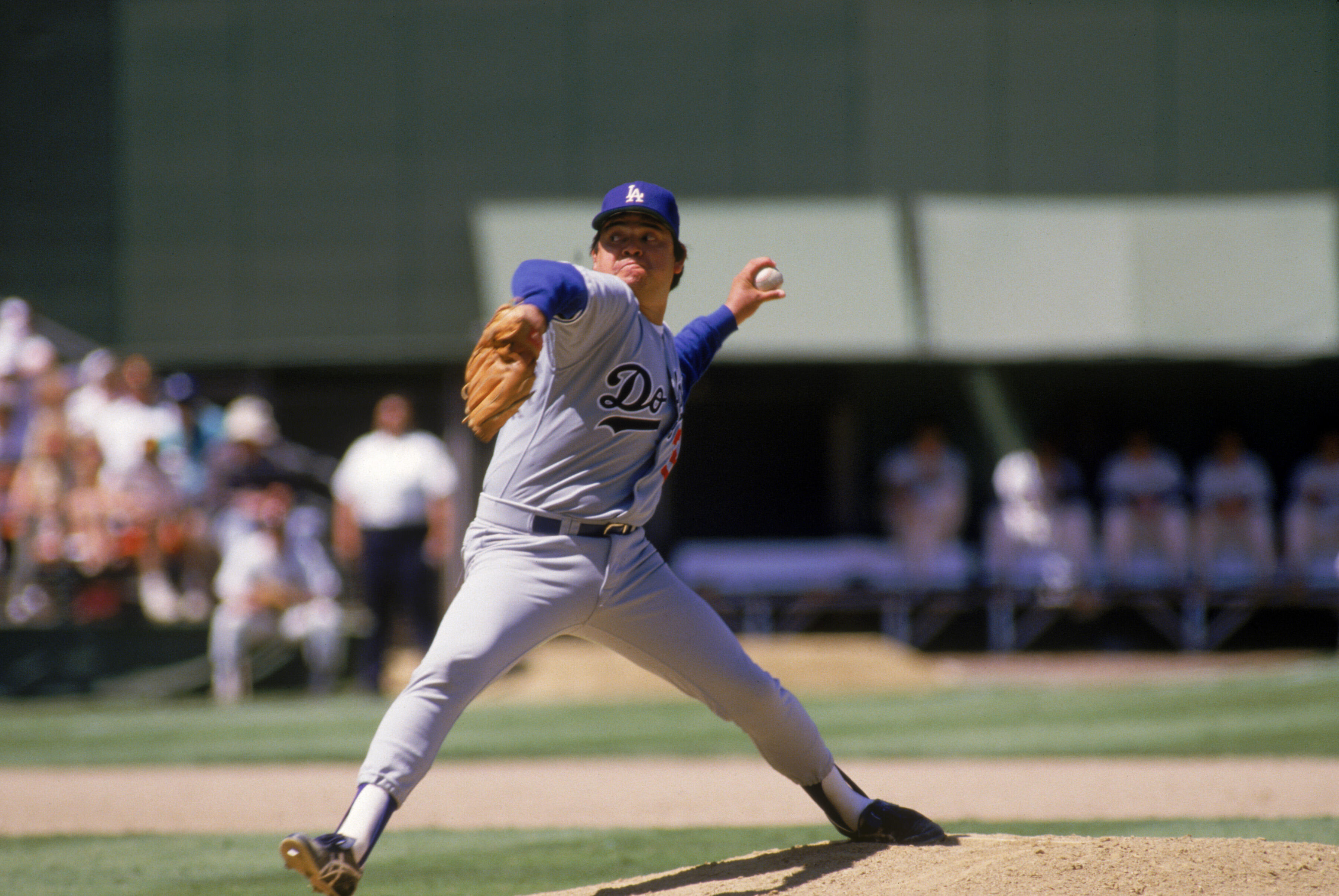 SAN DIEGO - 1987: Pitcher Fernando Valenzuela #34 of the Los Angeles Dodgers winds up for a pitch during a 1987 MLB season game against the San Diego Padres at Jack Murphy Stadium in San Diego, California. (Photo by: Stephen Dunn/Getty Images)
