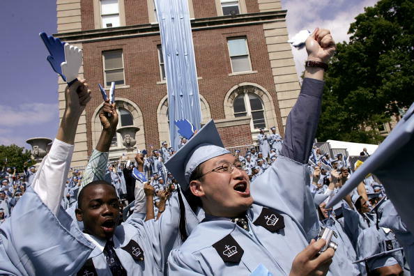 NEW YORK - MAY 18:  Students cheer during commencment ceremonies at Columbia University May 18, 2005 in New York City. This is the 251st class to graduate from Columbia.  (Photo by Spencer Platt/Getty Images)