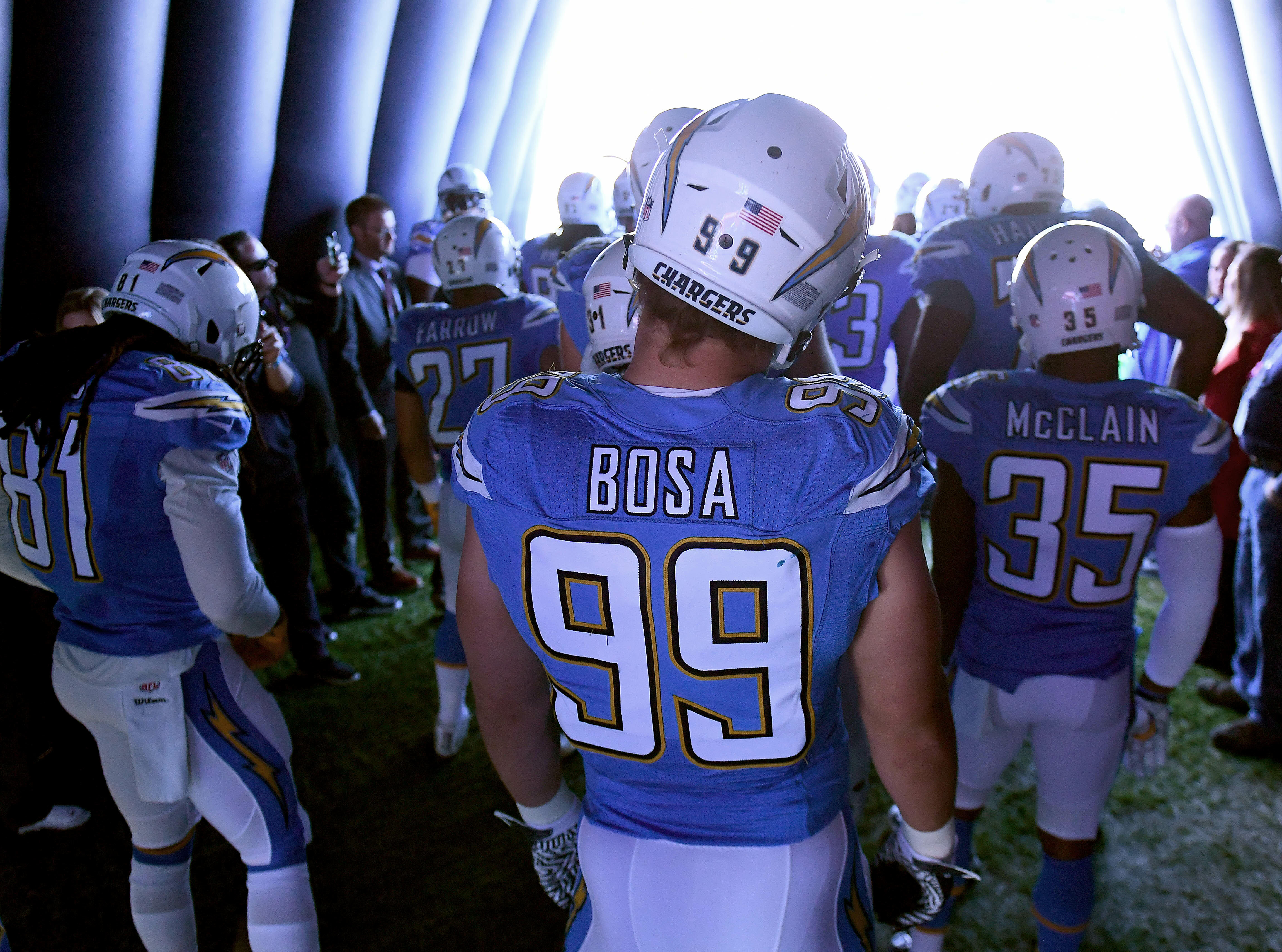 SAN DIEGO, CA - DECEMBER 18: Joey Bosa #99 of the San Diego Chargers prepares to enter the field against the Oakland Raiders at Qualcomm Stadium on December 18, 2016 in San Diego, California. (Photo by Donald Miralle/Getty Images)