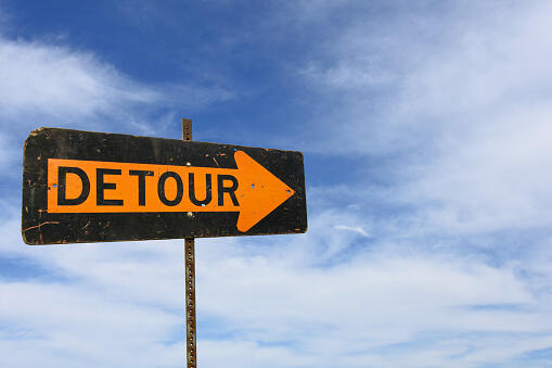 detour street sign on sky background