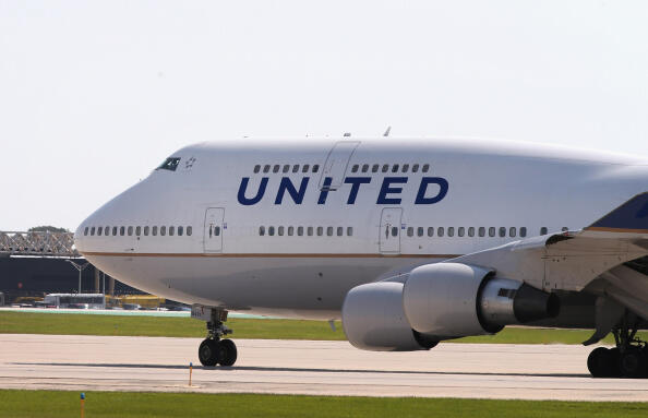 CHICAGO, IL - SEPTEMBER 19: A United Airlines jet taxis at O'Hare International Airport on September 19, 2014 in Chicago, Illinois. In 2013, 67 million passengers passed through O'Hare, another 20 million passed through Chicago's Midway Airport, and the t