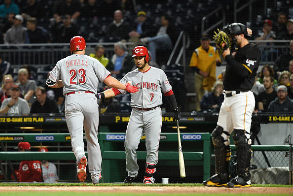 PITTSBURGH, PA - APRIL 11:  Adam Duvall #23 of the Cincinnati Reds is greeted by Eugenio Suarez #7 after hitting a solo home run in the second inning during the game against the Pittsburgh Pirates at PNC Park on April 11, 2017 in Pittsburgh, Pennsylvania. (Photo by Justin Berl/Getty Images)