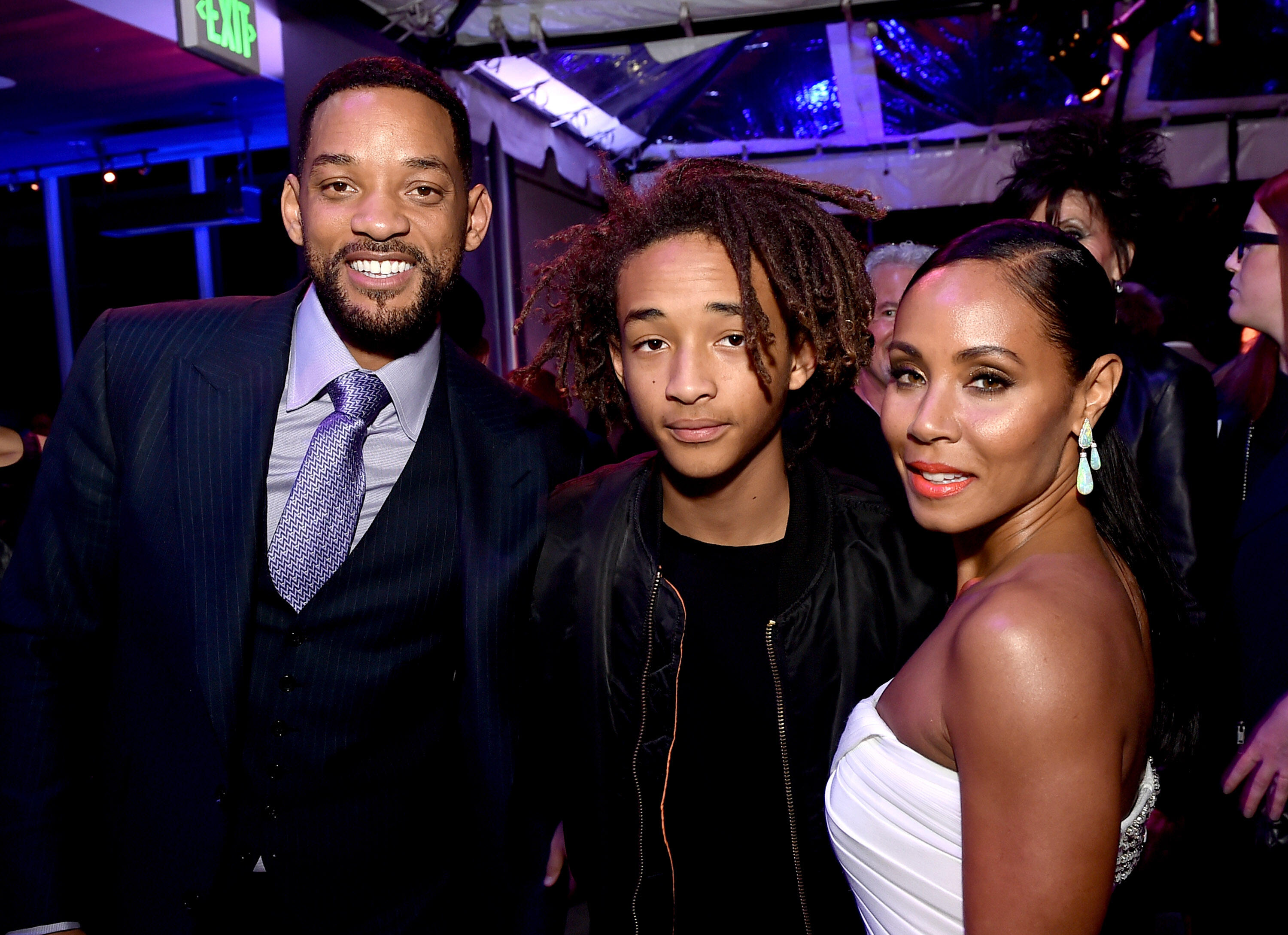 LOS ANGELES, CA - FEBRUARY 24:  (L-R) Actors Will Smith, son Jaden Smith and his wife Jada Pinkett Smith pose at the after party for the premiere of Warner Bros. Pictures' 
