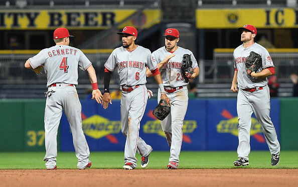 PITTSBURGH, PA - APRIL 11: Members of the Cincinnati Reds celebrate after the final out in their 6-2 win over the Pittsburgh Pirates at PNC Park on April 11, 2017 in Pittsburgh, Pennsylvania. (Photo by Justin Berl/Getty Images)