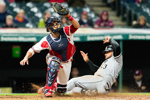 CLEVELAND, OH - APRIL 13: Catcher Yan Gomes #7 of the Cleveland Indians makes the catch as Melky Cabrera #53 of the Chicago White Sox scores during the eighth inning at Progressive Field on April 13, 2017 in Cleveland, Ohio. (Photo by Jason Miller/Getty Images)