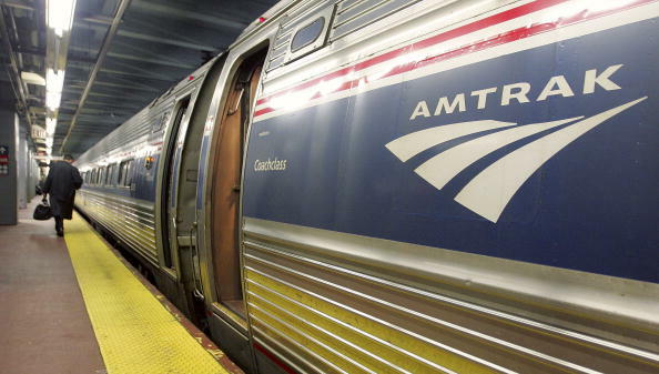 NEW YORK - NOVEMBER 17:  A man walks to board an Amtrak train in Penn Station November 17, 2005 in New York City.  Transportation Secretary Norman Y. Mineta said today that the board of Amtrak is looking for a new 