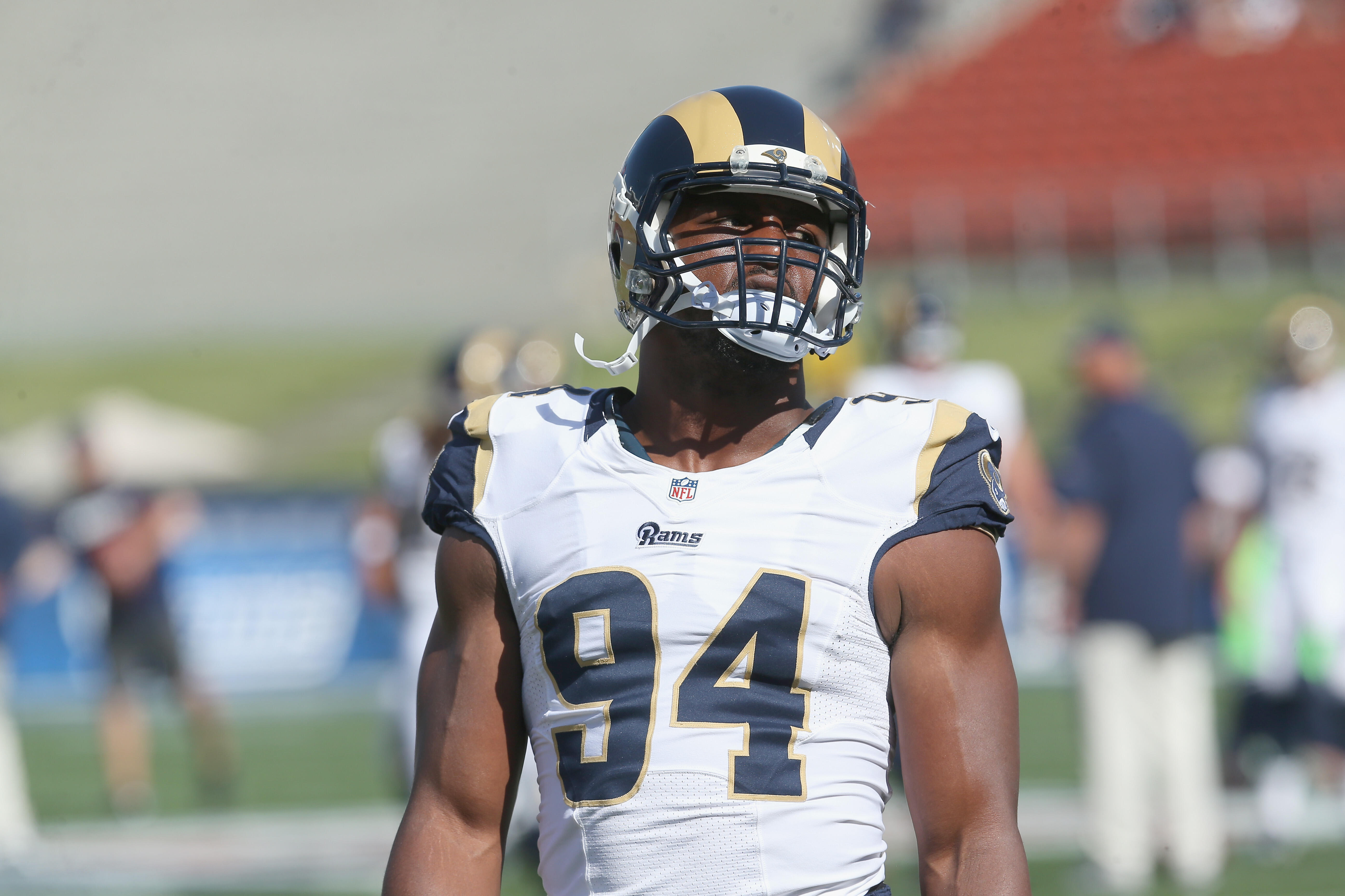 LOS ANGELES, CALIFORNIA - AUGUST 13:  Defensive end Robert Quinn  #94 of the Los Angeles Rams during warmups for the game with the DAllas Cowboys at the Los Angeles Coliseum during preseason on August 13, 2016 in Los Angeles, California.  (Photo by Stephe