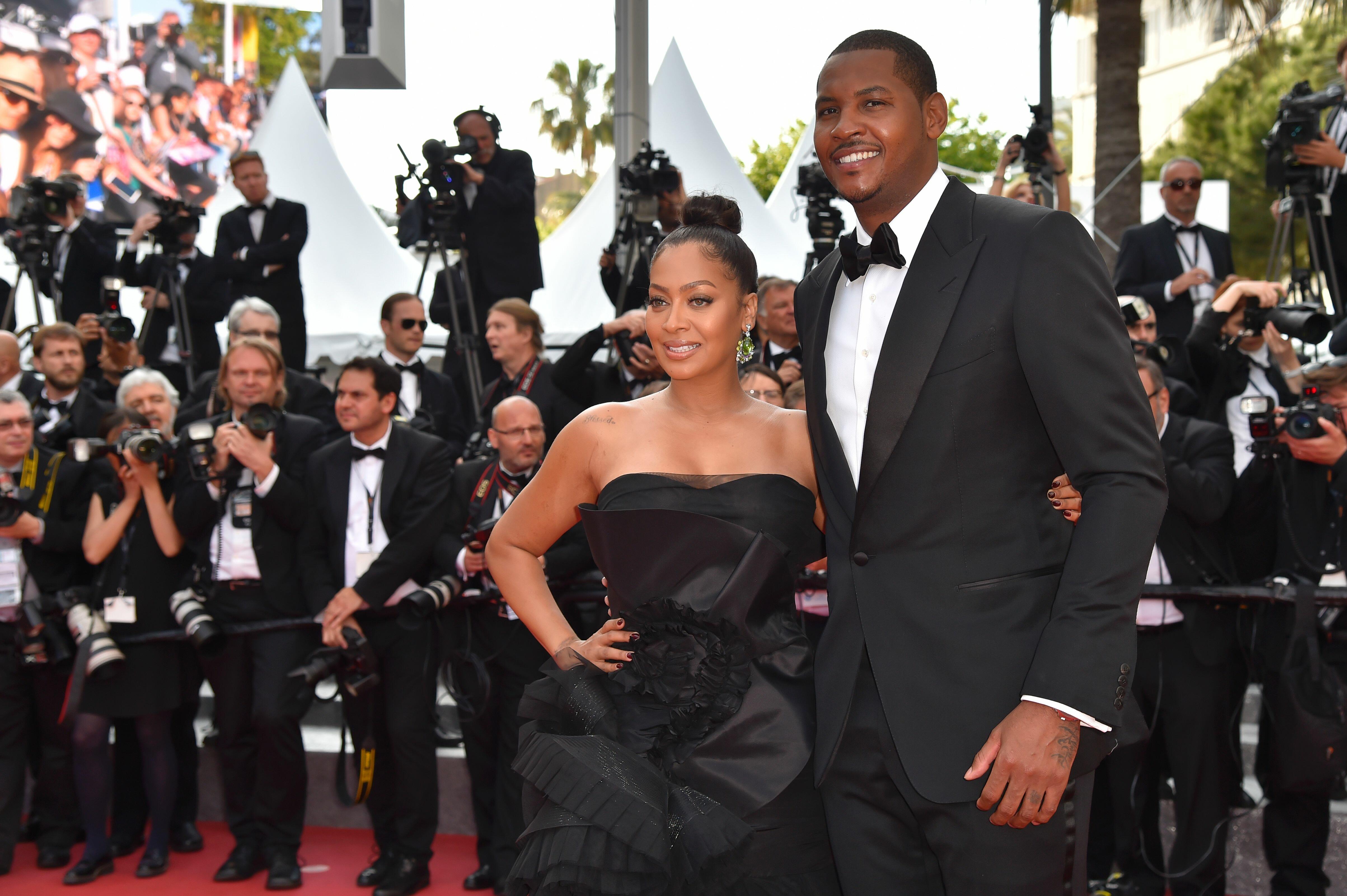  US radio and tv personality La La Anthony (L) and her husband US basketball player Carmelo Anthony pose as they arrive on May 16, 2016 for the screening of the film 