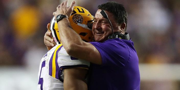 BATON ROUGE, LA - OCTOBER 01:  Derrius Guice #5 hugs head coach Ed Orgeron of the LSU Tigers after a touchdown against the Missouri Tigers at Tiger Stadium on October 1, 2016 in Baton Rouge, Louisiana.  (Photo by Chris Graythen/Getty Images)