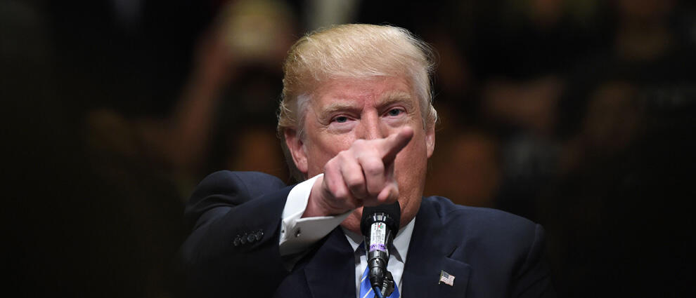 TOPSHOT - Presumptive Republican presidential candidate Donald Trump speaks at a campaign rally, May 25, 2016 in Anaheim, California.  Donald Trump said that if he is elected US president he would support the Canadian Keystone oil pipeline project that wa