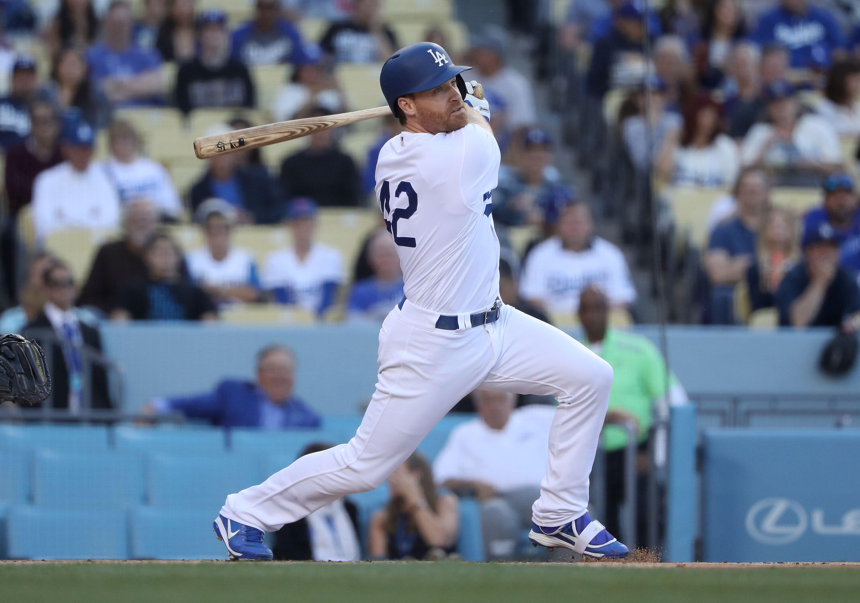LOS ANGELES, CA - APRIL 15: Logan Forsythe #11 of the Los Angeles Dodgers doubles to deep right field in the first inning during the MLB game against the Arizona Diamondbacks at Dodger Stadium on April 15, 2017 in Los Angeles, California.  All players are