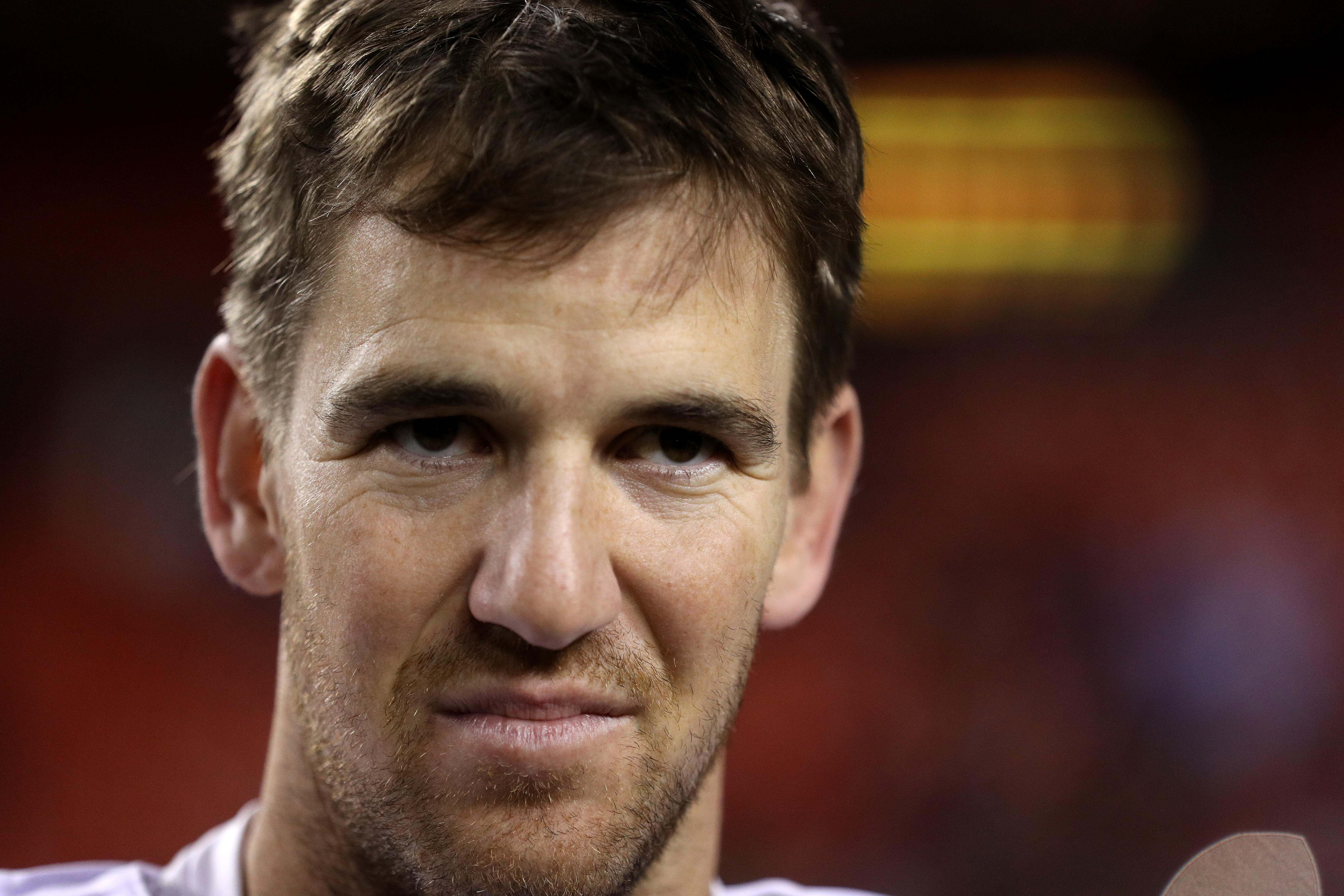 LANDOVER, MD - JANUARY 01: Quarterback Eli Manning #10 of the New York Giants looks on after the New York Giants defeated the Washington Redskins 19-10 at FedExField on January 1, 2017 in Landover, Maryland. (Photo by Patrick Smith/Getty Images)