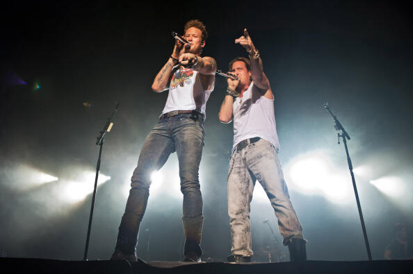 CHICAGO, IL - SEPTEMBER 09:  Brian Kelley and Tyler Hubbard of Florida Georgia Line perform at the Aragon Ballroom for the American Expresss Membership Experiences Concert Series on September 9, 2014 in Chicago, Illinois.  (Photo by Timothy Hiatt/Getty Im