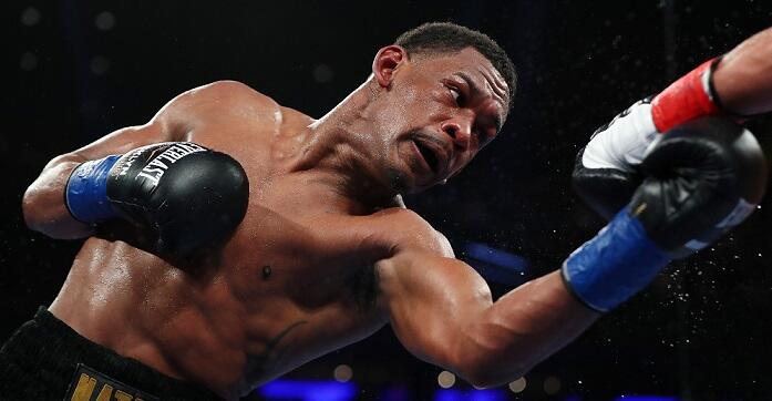 NEW YORK, NY - MARCH 18:  Daniel Jacobs  punches Gennady Golovkin during their Championship fight for Golovkin's WBA/WBC/IBF middleweight title at Madison Square Garden on March 18, 2017 in New York City.  (Photo by Al Bello/Getty Images)