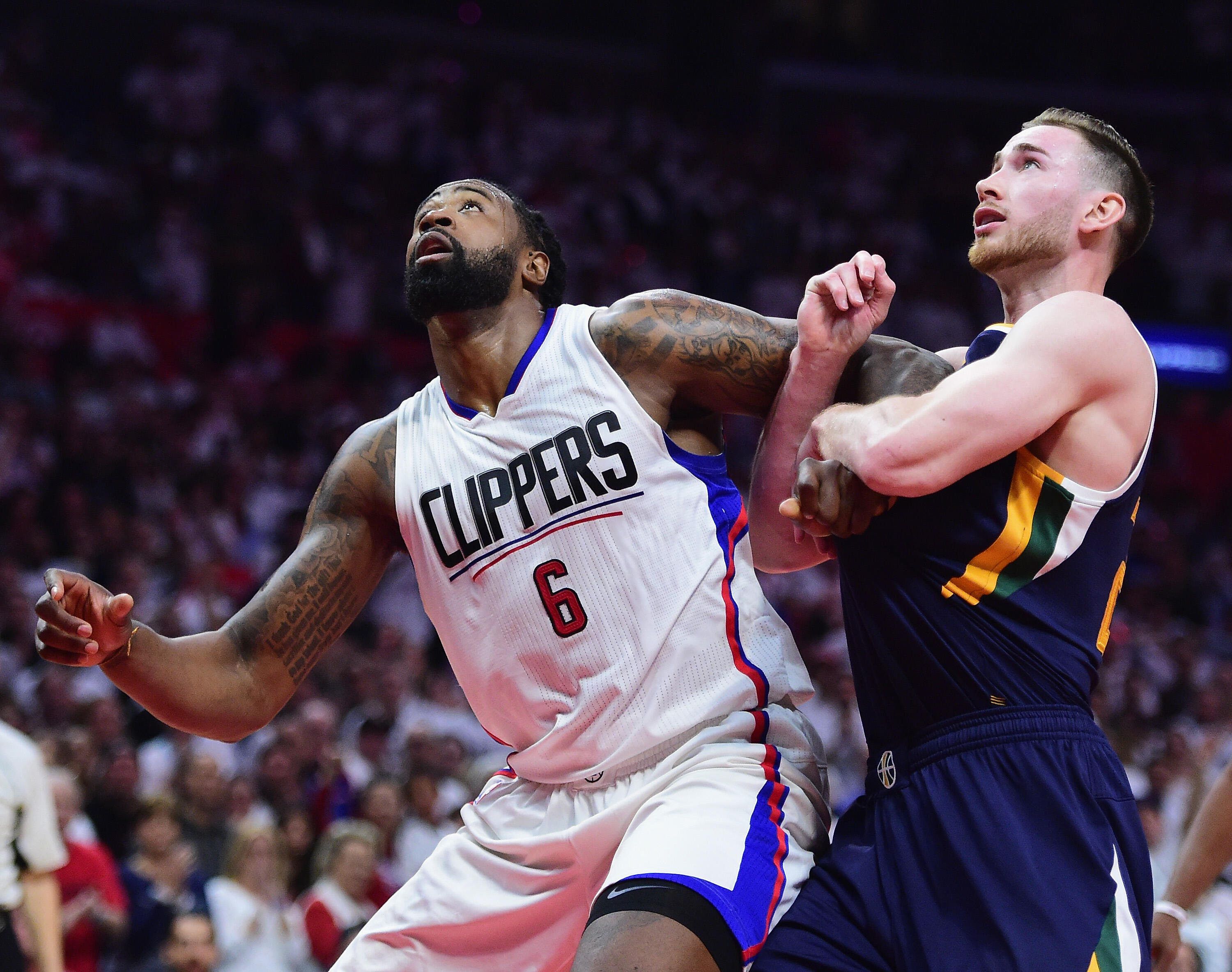 LOS ANGELES, CA - APRIL 15:  DeAndre Jordan #6 of the LA Clippers fends off Gordon Hayward #20 of the Utah Jazz for a rebound during a 97-95 Jazz win at Staples Center on April 15, 2017 in Los Angeles, California.  NOTE TO USER: User expressly acknowledge