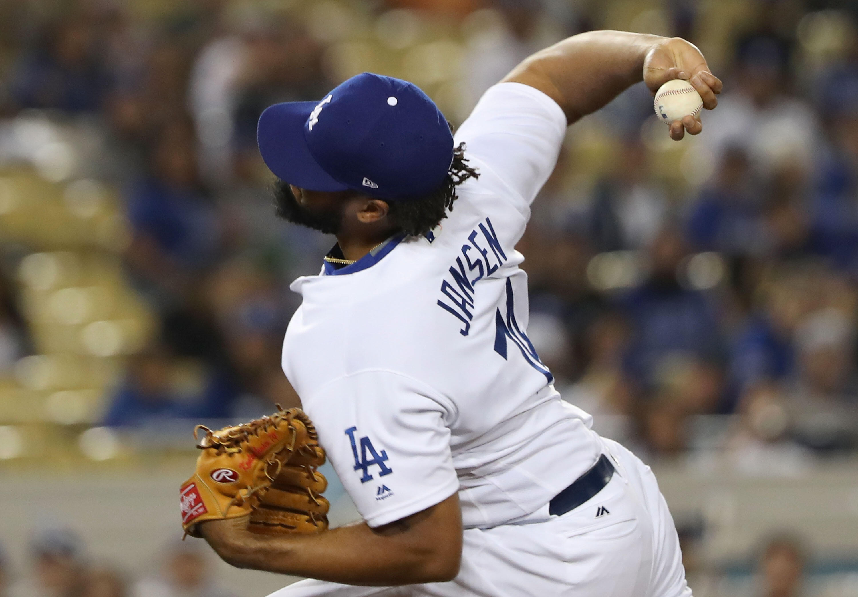 LOS ANGELES, CA - APRIL 05:  Pitcher Kenley Jansen #74 of the Los Angeles Dodgers pitches in the ninth inning during the MLB game against the San Diego Padres at Dodger Stadium on April 5, 2017 in Los Angeles, California. Jansen was credited with the save