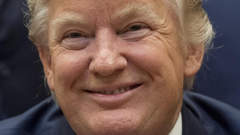 US President Donald Trump speaks after signing S. 544 the Veterans Choice Program Extension and Improvement Act in the Roosevelt Room of the White House in Washington, DC, April 19, 2017. / AFP PHOTO / SAUL LOEB        (Photo credit should read SAUL LOEB/