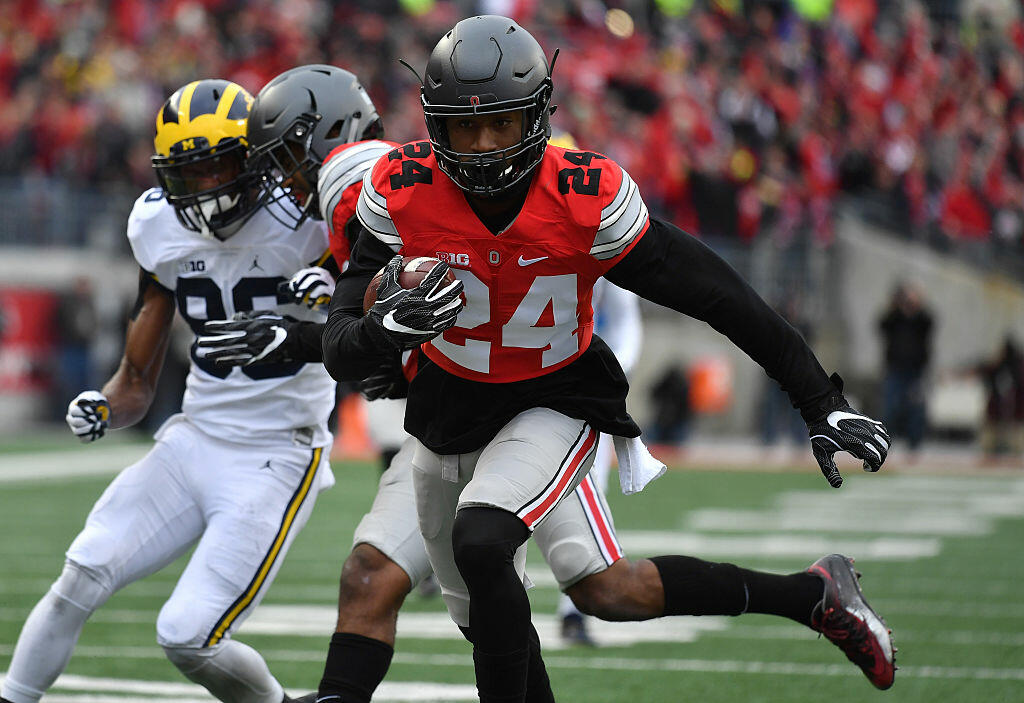 COLUMBUS, OH - NOVEMBER 26:   Malik Hooker #24 of the Ohio State Buckeyes runs for a touchdown after intercepting a pass by Wilton Speight #3 (not pictured) of the Michigan Wolverines during the first half of their game at Ohio Stadium on November 26, 2016 in Columbus, Ohio.  (Photo by Jamie Sabau/Getty Images)